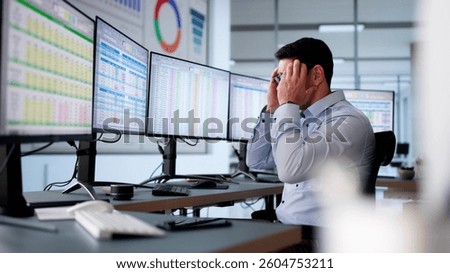 Data Analyst African Man Using Spreadsheet On Computer