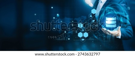Data analyst holding digital screen. Big Data processes large, complex datasets to uncover patterns, trends, and insights that support strategic business decisions.