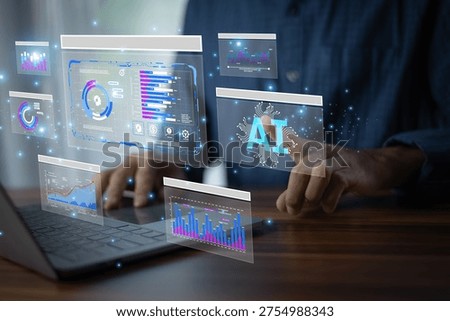 Data analyst using computer to perform AI artificial intelligence data analysis and visualize business insights through advanced digital analytics technology.