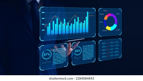 Data analyst working on business analytics dashboard with charts, metrics and KPI to analyze performance and create insight reports and strategic decisions for operations management on virtual screen.
