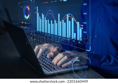 Data analyst working on business analytics dashboard with charts, metrics and KPI to analyze performance and create insight reports for operations management.