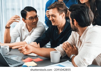 Data analysts team of office worker collaborate on business intelligence BI dashboard to analyze financial, trend, and marketing data. BI software utilization drive business success. Prudent