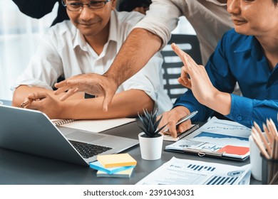 Data analysts team of office worker collaborate on business intelligence BI dashboard to analyze financial, trend, and marketing data. BI software utilization drive business success. Prudent