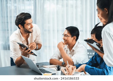 Data analysts team of office worker collaborate on business intelligence BI dashboard to analyze financial, trend, and marketing data. BI software utilization drive business success. Prudent