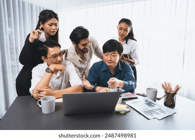 Data analysts team of office worker collaborate on business intelligence BI dashboard to analyze financial, trend, and marketing data. BI software utilization drive business success. Prudent