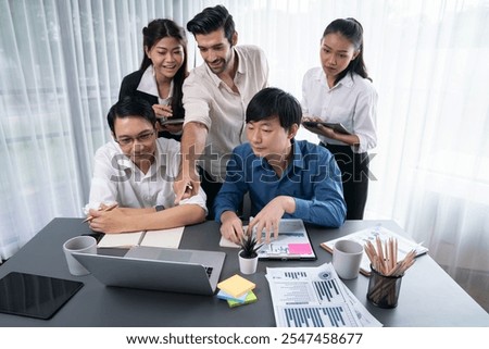 Data analysts team of office worker collaborate on business intelligence BI dashboard to analyze financial, trend, and marketing data. BI software utilization drive business success. Prudent