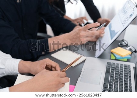 Data analysts team of office worker collaborate on business intelligence BI dashboard to analyze financial, trend, and marketing data. BI software utilization drive business success. Prudent