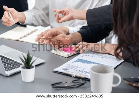 Data analysts team of office worker collaborate on business intelligence BI dashboard to analyze financial, trend, and marketing data. BI software utilization drive business success. Prudent