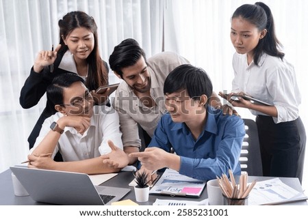 Data analysts team of office worker collaborate on business intelligence BI dashboard to analyze financial, trend, and marketing data. BI software utilization drive business success. Prudent