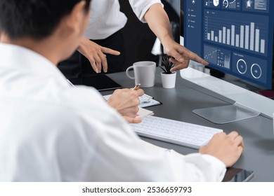 Data analysts team working analyzing business intelligence BI dashboard display on laptop to analyze financial, trend, and marketing data. BI technology and data analysis for business success. Prudent - Powered by Shutterstock