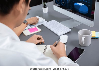 Data analysts team working analyzing business intelligence BI dashboard display on laptop to analyze financial, trend, and marketing data. BI technology and data analysis for business success. Prudent - Powered by Shutterstock