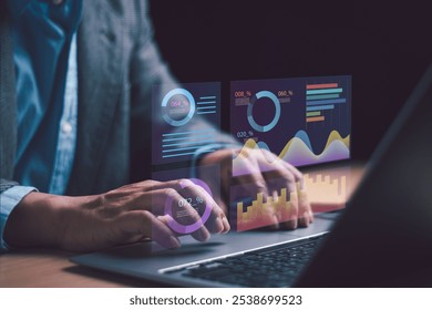 Data analysts work with computer, analyze business data using statistical graph, manage work structure data on dashboard, evaluate and measure the performance of business organization.