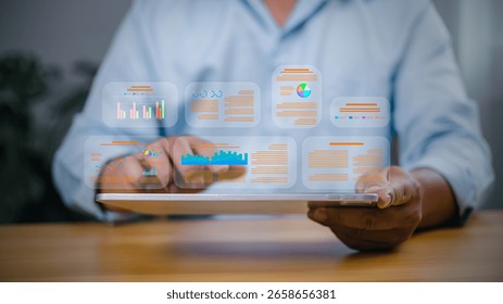 Data analytics concept with businessman using tablet to analyze digital report and charts. Business intelligence and technology dashboard.