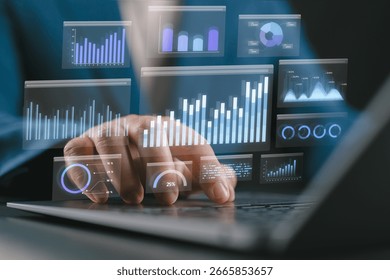 Data analytics and graphs. Analysis of statistical business marketing data. Data scientist using laptop computer to analyze data.