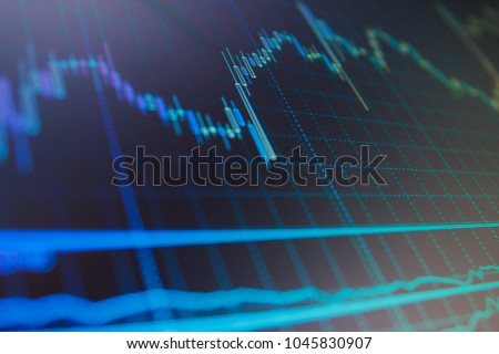 Data analyzing in forex market: the charts and quotes on display. Finance stock market investment trading. Stock market concept and background. 