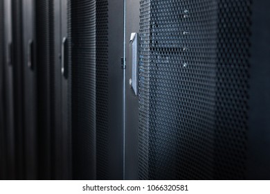 Data center. Black metal stylish modern server cabinets in a data center