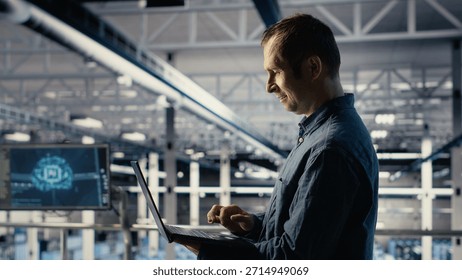 Data center engineer monitors machine learning process with laptop, reviewing operational metrics. IT specialist reviews neural networks reports during inspection to verify ongoing stability, camera B