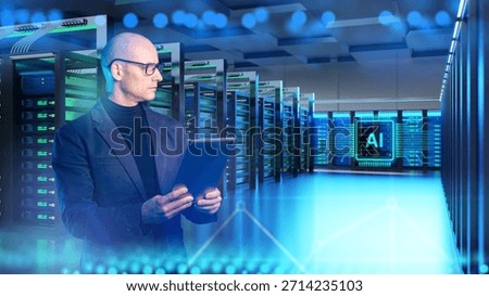 Data center engineer supervises AI-powered server infrastructure using a tablet, managing digital systems, network performance and high-capacity computing operations.