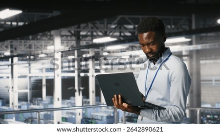 Data center engineering team on industrial platform collaborating to maintain blade servers. Technicians coordinating infrastructure tasks to support machine learning automatization of infrastructure