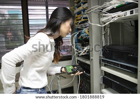 Data center hardware updates close-up. Installation of harddisk server in the server room.