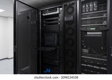 Data Center With Multiple Rows of Fully Operational Server Racks.  - Powered by Shutterstock - Get 15% off with code: PIKWIZARD15