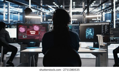 Data center programmer seeing critical error message while using node tree software to analyze datasets. Server room worker receiving glitch popup warning while using visual programming tool, camera A