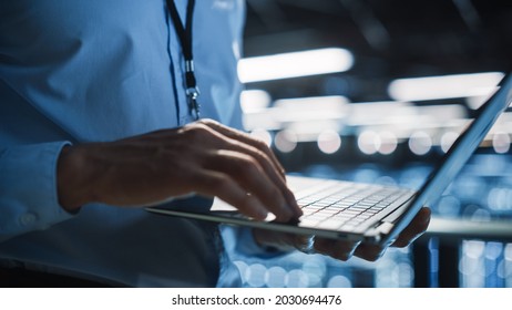 Data Center Programmer Using Digital Laptop Computer, Maintenance IT Specialist. Cloud Computing Server Farm System Administrator Working On Cyber Security For Iaas, Saas, Paas. Closeup Focus On Hands