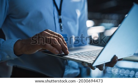 Data Center Programmer Using Digital Laptop Computer, Maintenance IT Specialist. Cloud Computing Server Farm System Administrator Working on Cyber Security for Iaas, saas, paas. Closeup Focus on Hands