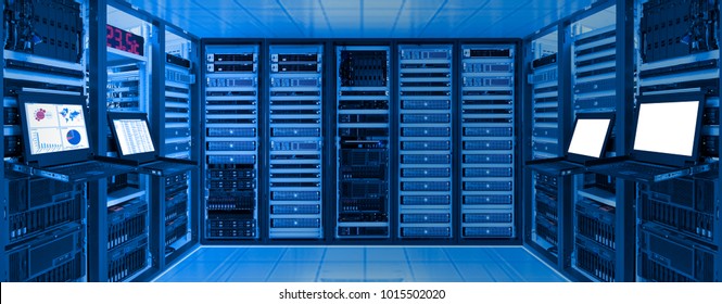 Data center room with server and networking device on rack cabinet, kvm monitor screen display chart, log and blank screen - Powered by Shutterstock