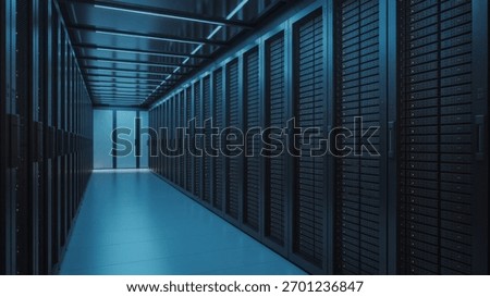 A data center with rows of server racks is essential for cloud computing and data processing. It ensures seamless operations and robust cybersecurity measures.
