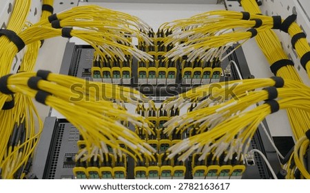 Data Center Server Racks with Yellow Network Cables Supporting AI and High Performance Computing Infrastructure