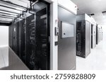 Data center server room with rows of server racks and networking equipment