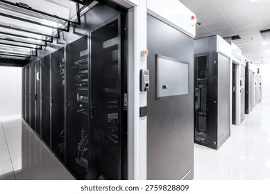 Data center server room with rows of server racks and networking equipment