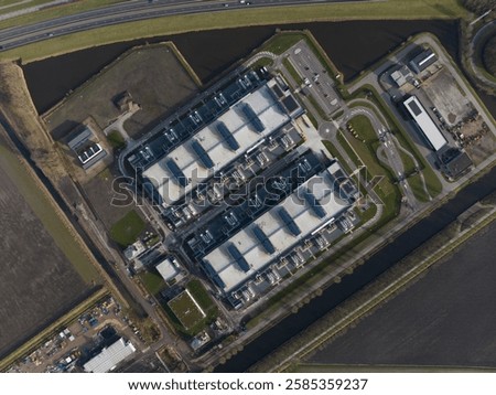 Data center, super computer, quantum computing, storage clouds space and internet infrastructure in the Netherlands, an aerial drone video.
