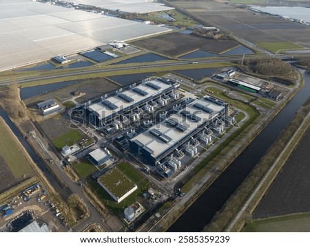Data center, super computer, quantum computing, storage clouds space and internet infrastructure in the Netherlands, an aerial drone video.