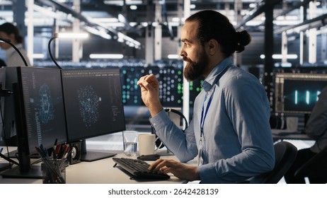 Data center system administrator talking with coworker in office while doing software updates. Server room IT expert and colleague chatting, optimizing infrastructure rackmounts configuration, camera