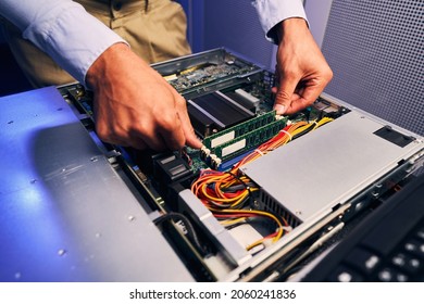 Data Center Worker Replacing Network Server Components
