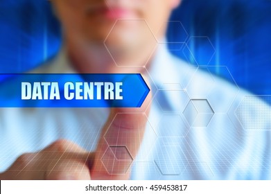 "Data centre" concept. A man press virtual blue button "Data centre".