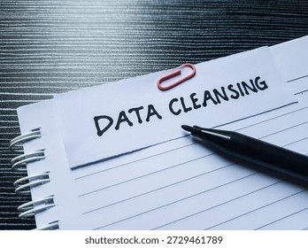 Data cleansing writting on table background.
