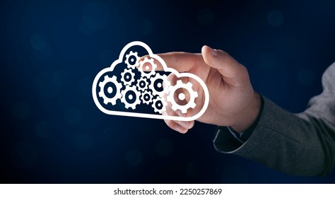 Data cloud with gears. Man tapping on the screen