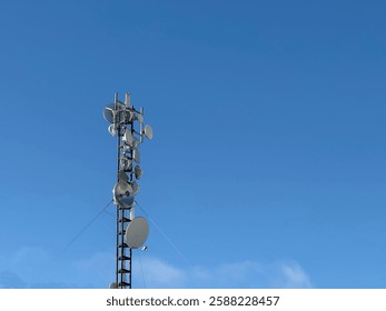 Data communication tower on the building roof, 5g tower, mobile data transfer  