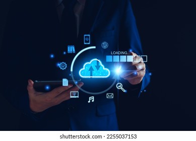 Data download from cloud computing concept. Man using smartphone and computer to download, upload business information, media files. Cloud computing technology, intelligent storage on Internet