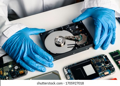 data hard drive backup disc hdd disk restoration restore recovery engineer work tool virus access file fixing failed profession engineering maintenance repairman technology concept - Shutterstock ID 1705927018