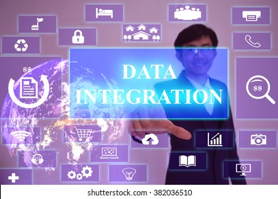 DATA INTEGRATION concept  presented by  businessman touching on  virtual  screen ,image element furnished by NASA