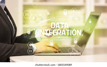 DATA INTEGRATION inscription on laptop, internet security and data protection concept, blockchain and cybersecurity