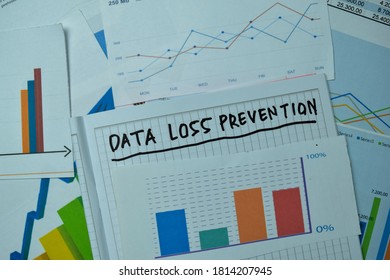 Data Loss Prevention write on sticky notes with graphs and diagram isolated on office desk.