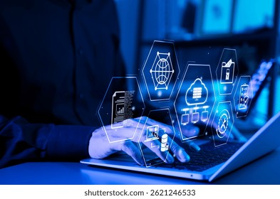 Data Management and Cloud Technology Concept. Hands typing on laptop with digital icons representing cloud computing, big data analysis, file security, transfer, data center, and system management.