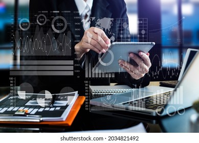 Data Management System with Business Analytics concept. business team hands working with provide information for Key Performance Indicators and marketing analysis onn virtual computer  - Shutterstock ID 2034821492