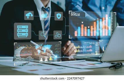 Data Management System (DMS) and Business Analytics Concept. businessman working and analysis connect to the dashboard to provide information for Key Performance Indicators (KPI), marketing analysis - Shutterstock ID 2247097427