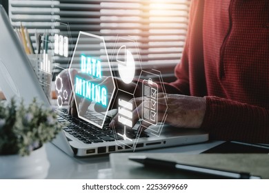 Data mining banner web icon for business and organization, Businessman working on laptop computer with data mining icon on VR screen, internet and networking concept.